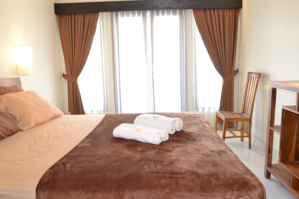 Ferienwohnung Pujihouse One Legian Zimmer foto
